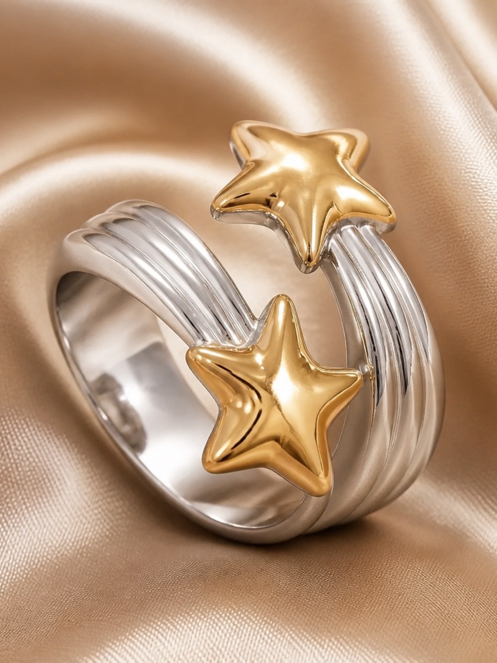 The Starlight Orbit Two-Tone Star Wrap adjustable ring
